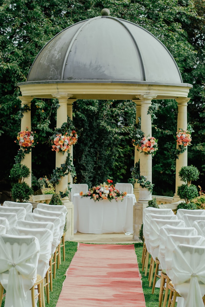 A garden arbour dressed for a ceremony