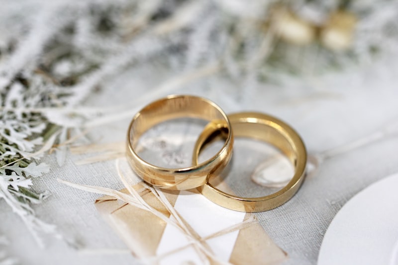 Two wedding bands on linen