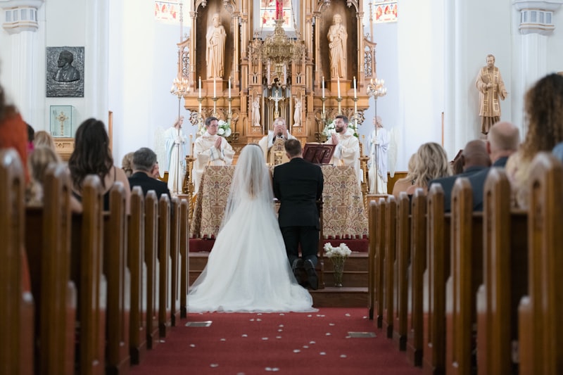 A couple walking back down the aisle after the ceremony