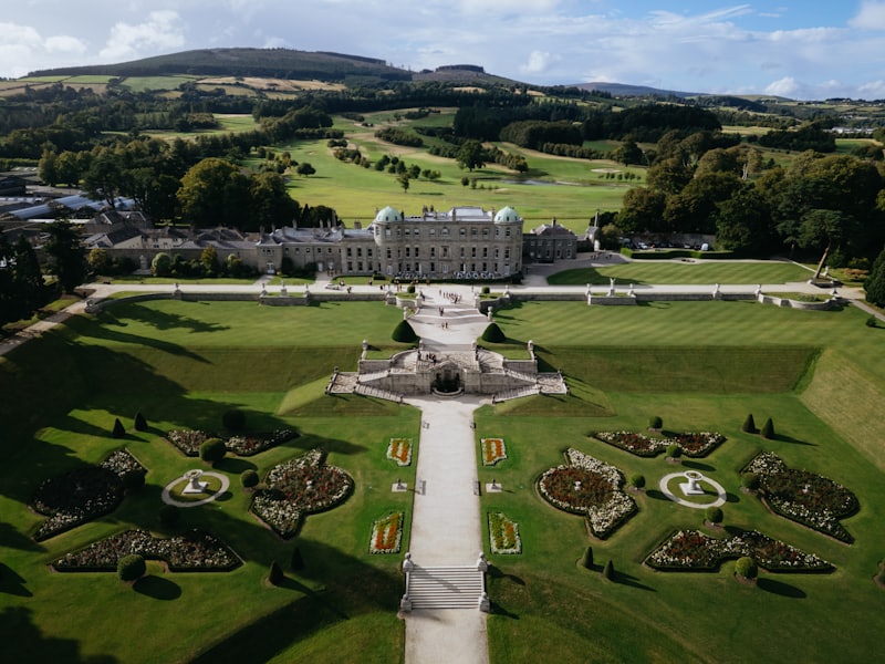 A grand estate with formal gardens, laid out for a wedding